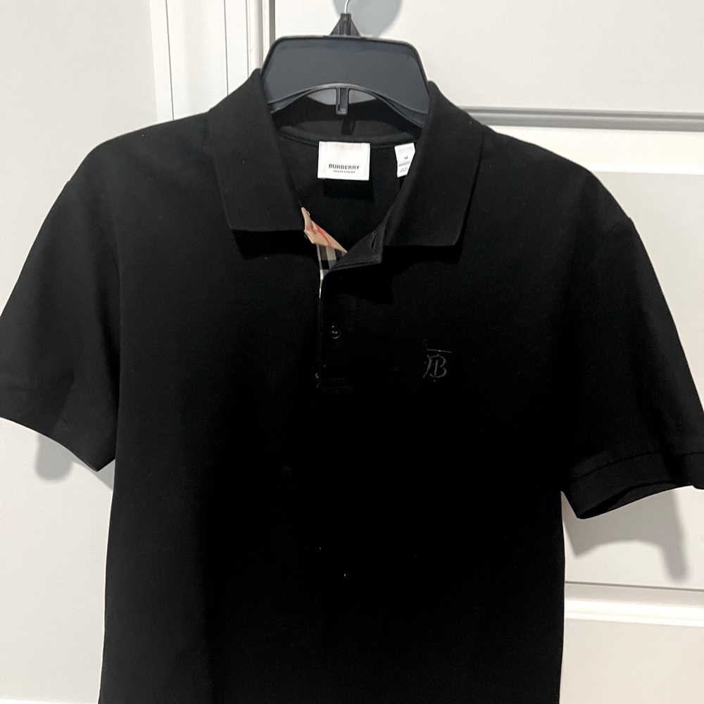 Black Burberry Polo shirt size Medium